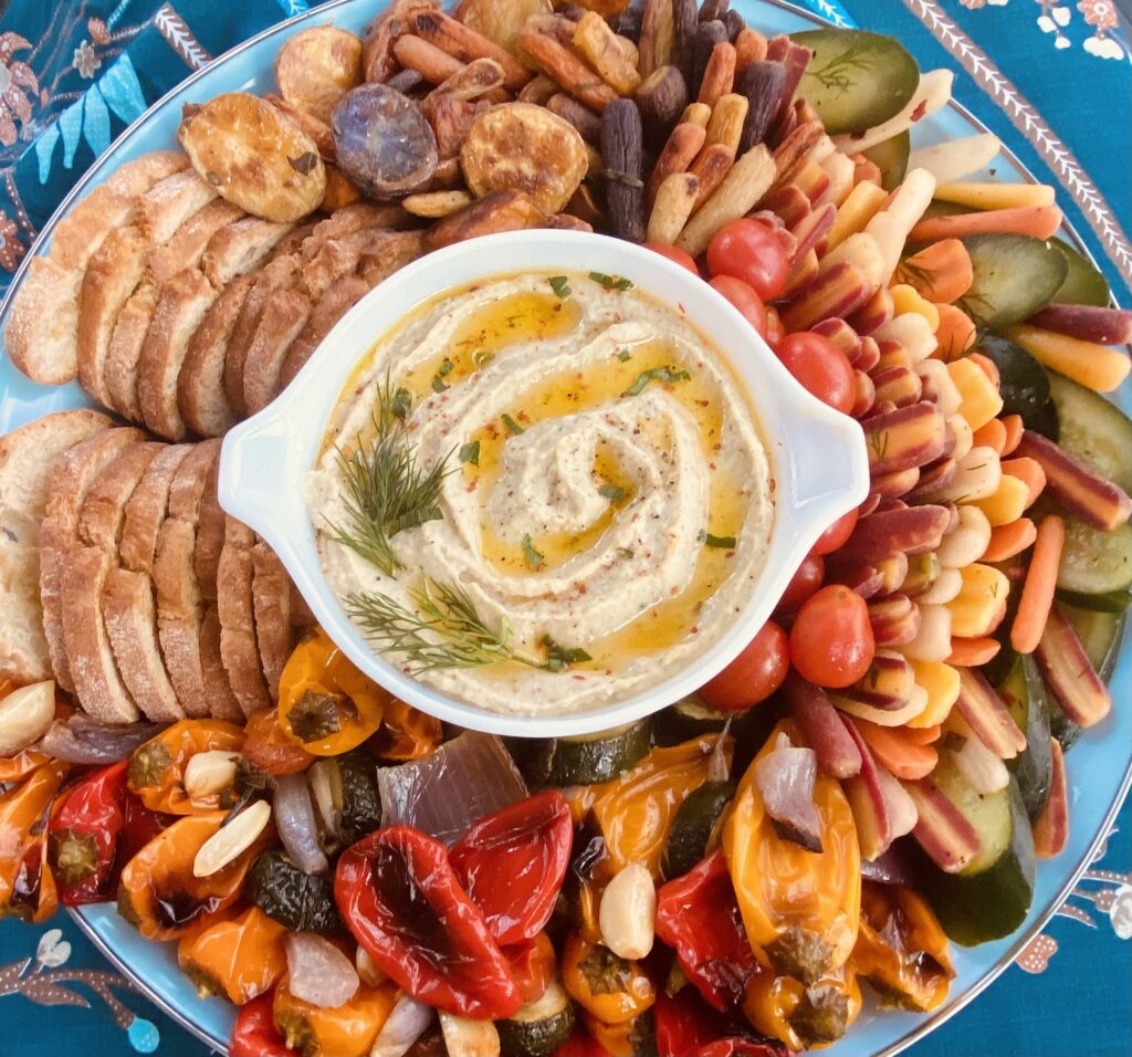 Dill, Artichoke & Cannellini Bean Spread with veggies and crostinis